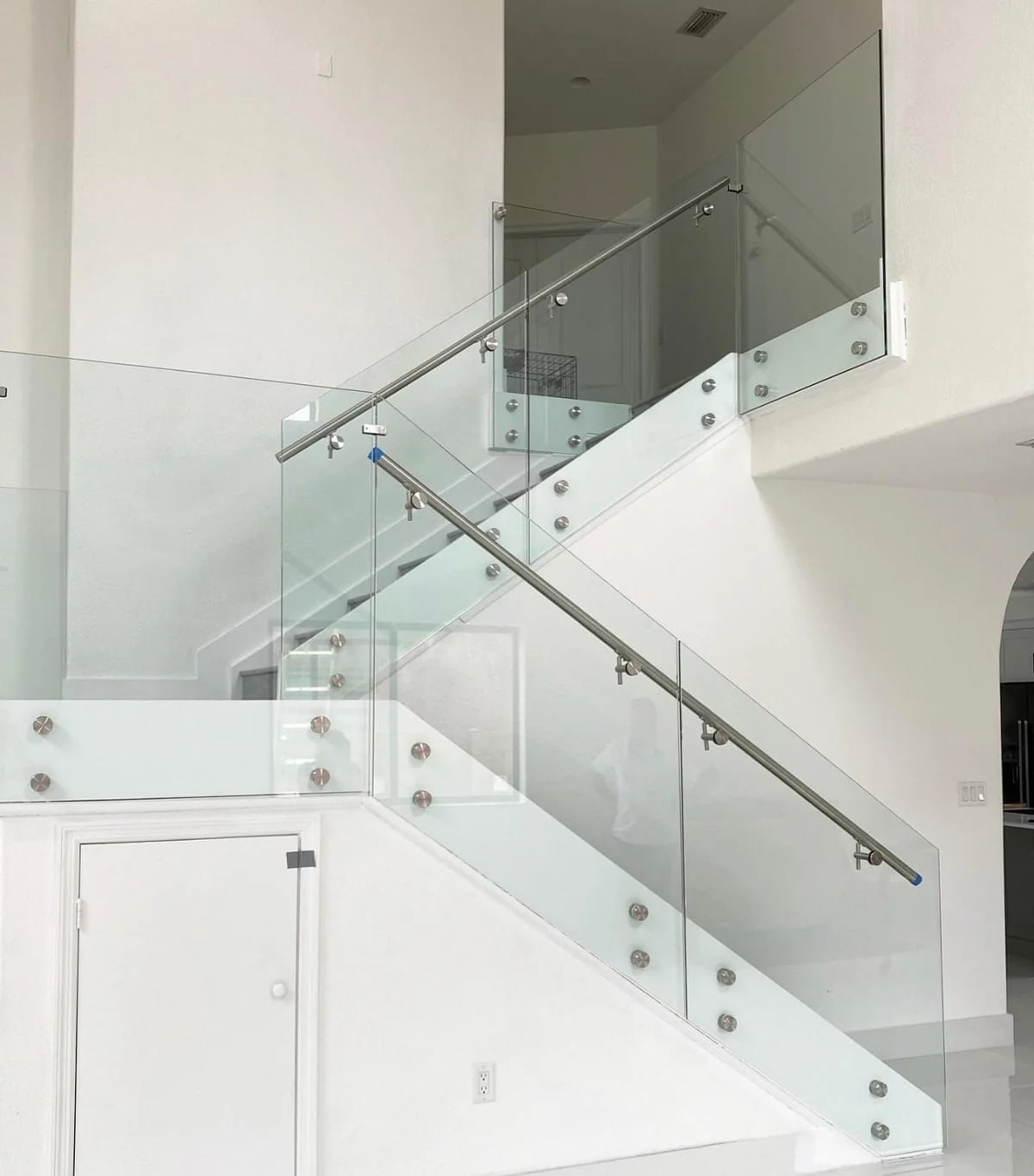 Transparent glass railing modern home South Florida