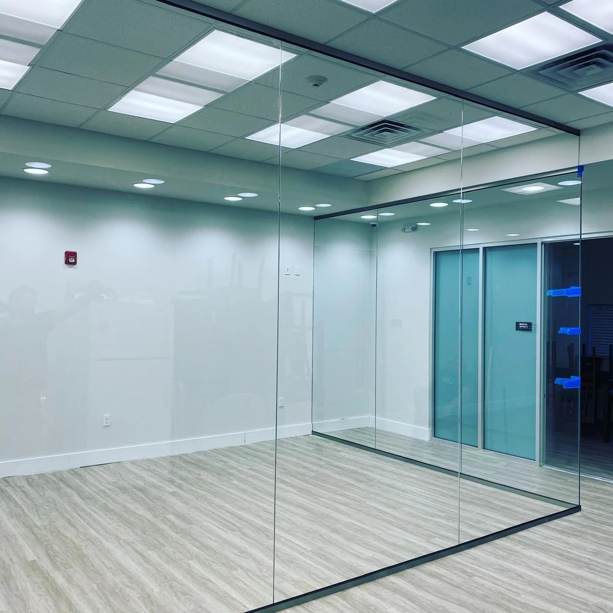 Custom glass partition Miami commercial