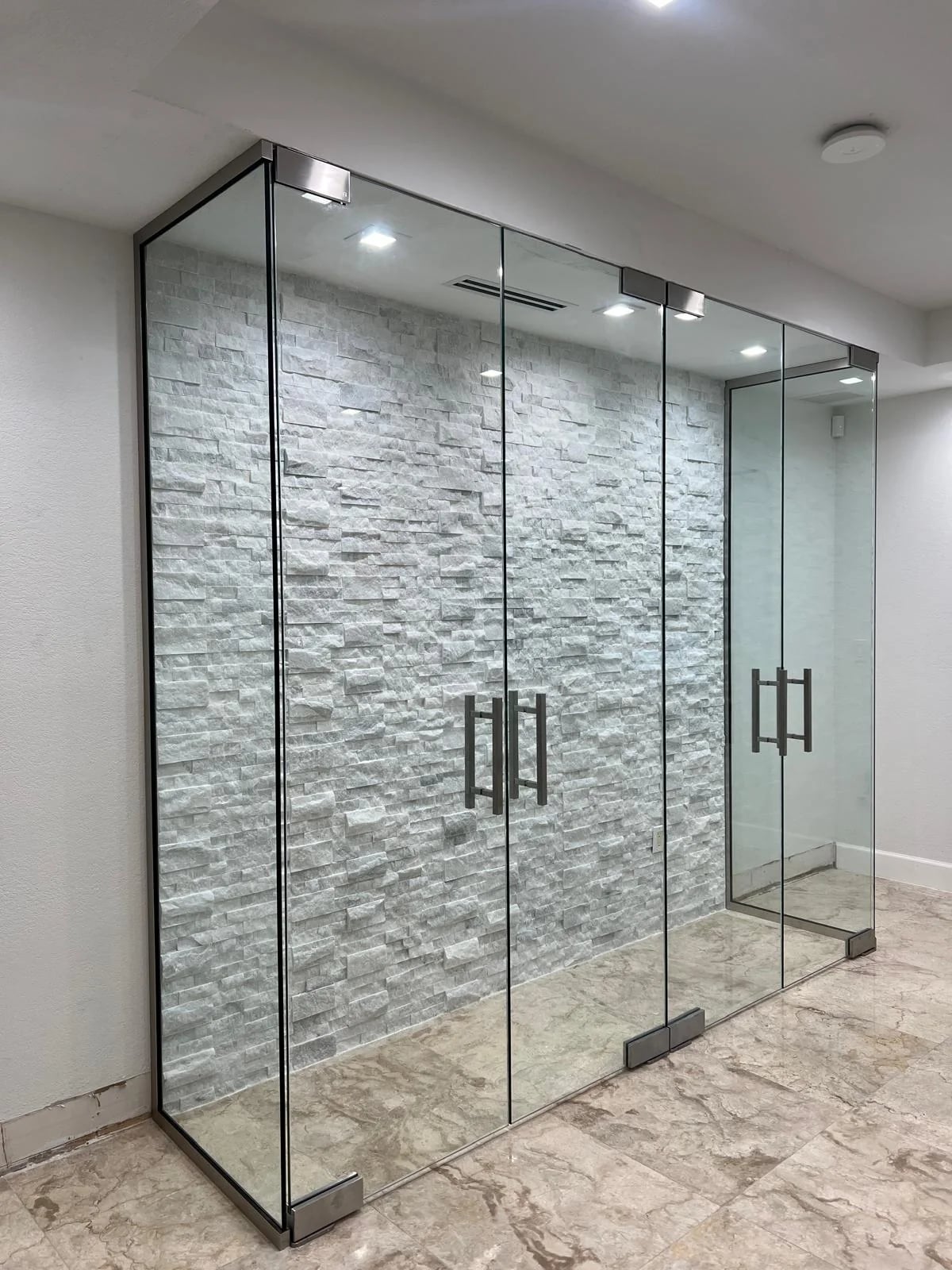 Custom glass wine cellar installation Miami